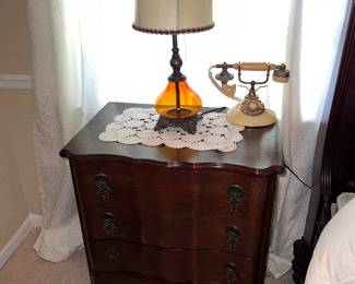 Amber glass vintage lamp and retro princess phone