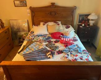 Wood Bed Frame Full, Full Mattress and Boxspring, Clothing, Antique Carved Mayan Wall Mask (A), Antique Carved Mayan Wall Mask (B), Vtg. Blue Floral Halter Top, Vtg. Halter Top, Vtg. Red Floral Halter Top