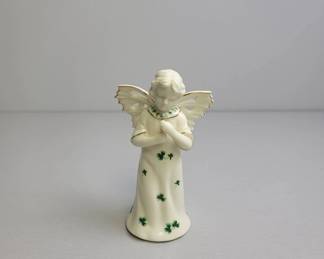 Porcelain Angel Figurine with Clover Motif