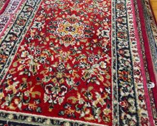 One of the small oriental area rugs