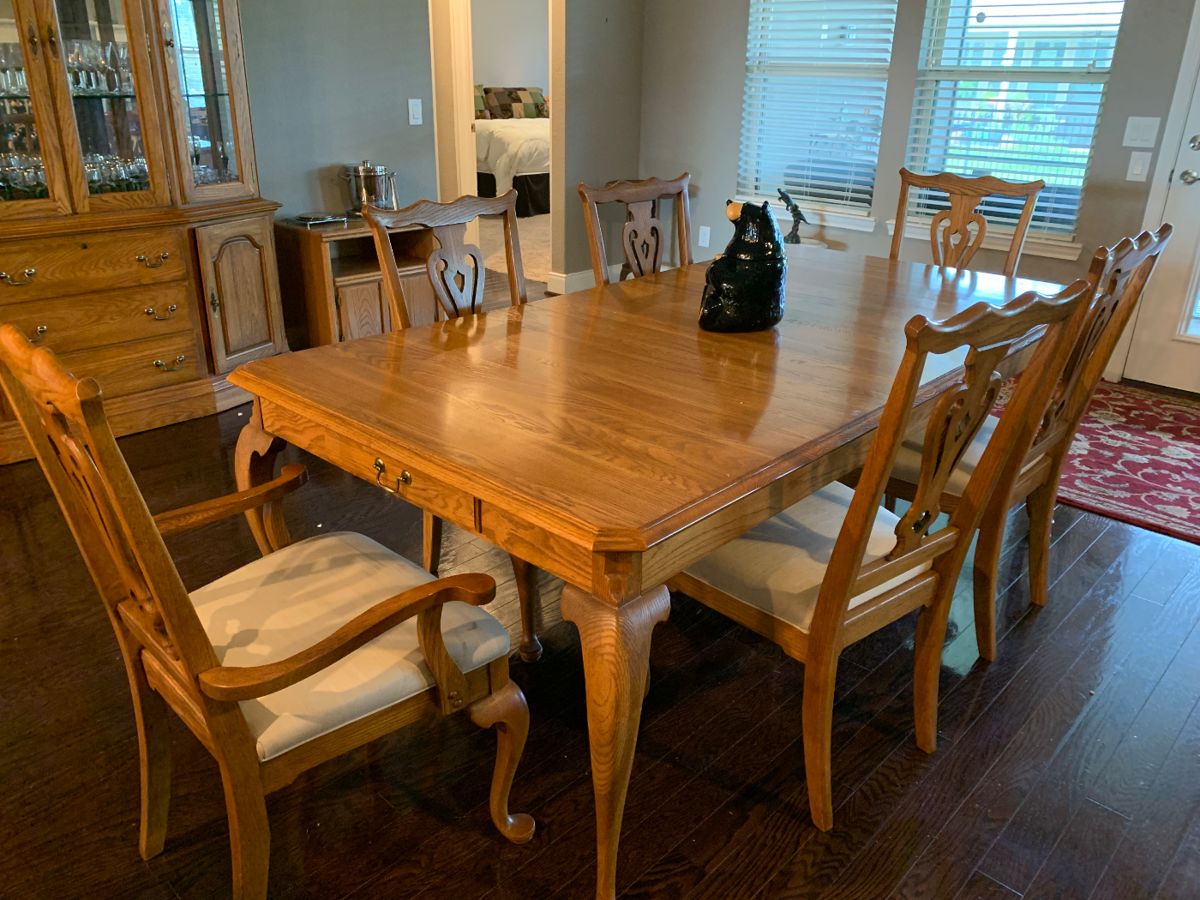 Solid wood dining room table with 8 chairs