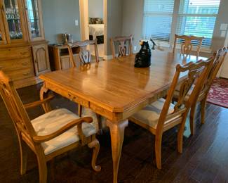 Solid wood dining room table with 8 chairs