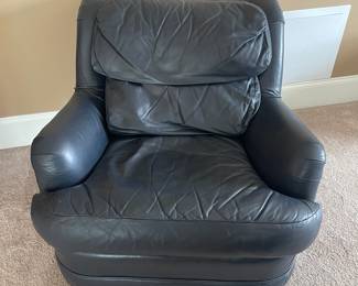 K38 - $65 - Blue Leather Chair w/ Ottoman. Measures 35w x 34d x 30t