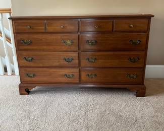 K30 - $200. Permacraft Solid Cherry Dresser. Measures 54" wide x 20" deep x 33 tall.