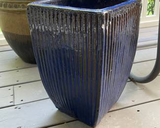 K130 - $20. Ceramic planter with sparkling blue glaze. Has a repaired corner as pictured. 7.5" square interior. 14" tall.