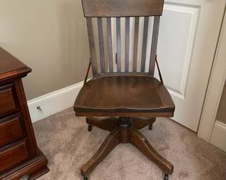 K115 - $95. 1940s Vintage Bankers Chair. Measures 18w x 16.5 x 36.5