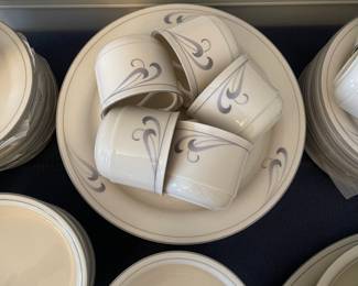 K89 - $150. Lenox Grey Brushstrokes set. Platter, 2 serving bowls, 13 dinner plates, 12 cereal bowls, 11 tea cups, 18 saucers, 14 salad plates, creamer.