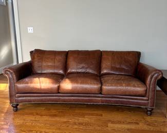 K43 - $1200 - Bradington Young Leather Sofa. Cognac Brown cushions that could use a good conditioning. See photos. No rips, holes etc. Lots of life left!!! Measures 90"w x 35"d x 34"t