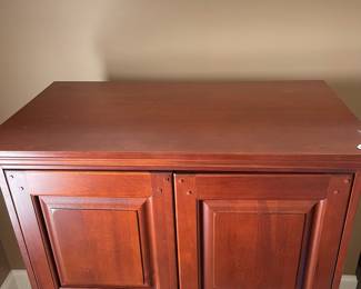 K33 - $60. Small Armoire. Measures 35.5" wide x 21" deep x 54.5" tall.