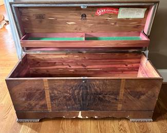 K61 - $50. Cedar Chest. Used condition with wear along the bottom. Inside is meticulous. 46"w x 18"d x 22"t