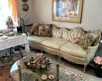Formal French Provencial Sofa, wool rug, glass coffee table