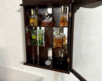 small cabinet with fine perfumes