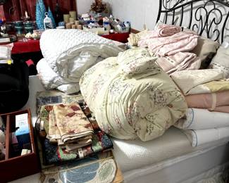linens and iron bed