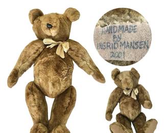 Rare and special Ingrid Rhea Mansen (not to be confused with Louise Mansen) handmade humpback bear from 2001.  Ms. Mansen has informed us personally that this is one of only two bears made from an aunt’s coat for her cousins.  He is 18" tall and fully jointed.  To learn more about Ingrid Mansen’s personalized bears, google: @remembearingridmansen.  