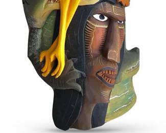 A hand-carved rainforest mask by Germán Morales Delgado from the Boruca peoples of Costa Rica; about 21-22"H.  This mask was exhibited in the 2023 Sarasota Selby Gardens exhibit of rainforest carvings.  More information on the artist can be found at  https://lucuma.com/pages/german-morales-delgado.