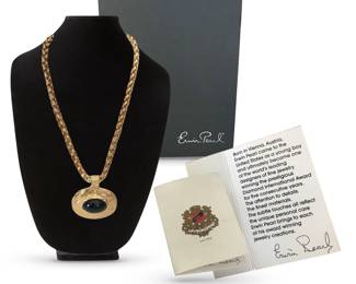Erwin Pearl goldtone oval pendant necklace with faux black onyx cabochon center; includes box and brochure; about 10”