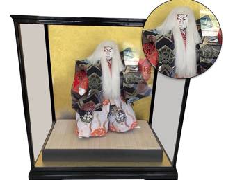 Traditional Japanese Kabuki doll representing white lion "Kagami Jishi" with splendid white mane and wearing hakama pants and elegant kimono; case 19"H x 18"W