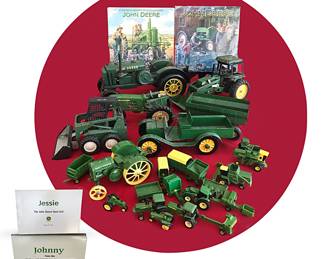 Large collection of John Deere collectibles, sold separately; includes toy trucks, calendars and two 1999 porcelain dolls (not shown), Jessie the John Deere Farm Girl and Johnny, in excellent condition in their boxes and with papers