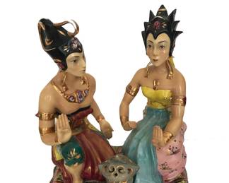 Nice wedding/anniversary gift:  Vintage ceramic Indonesian marriage couple as interpreted by DG of Italy, c. 1960; referencing or depicting Java’s revered agrarian goddess Dewi Sri and her consort Sadono, known together as Loro Blonyo ( "two anointed as one”); conventional Loro Blonyo attire includes groom’s tubular sarong, bride’s bare shouldered kemben with traditional waist cloth; elaborate headdresses signifying royal or sacred status; 15"H x 12” W (NOTE: While the figures are sometimes identified as Rama and Sita, or as related to them, Loro Blonyo are discrete secular symbols of a happy marriage throughout Java and Bali where they are wood carved, not ceramic.)