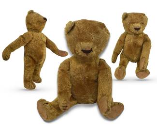 Fine, representative example of an antique more-than-likely Stieff teddy bear; missing an ear and original eyes; Stieff has provided a list of "caregivers" known to authenticate, appraise and repair Stieff bears; 18”H