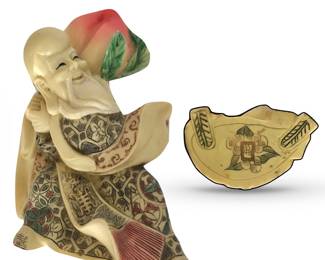 Shou Lao resin figure carrying his peach, representing longevity; base of figure shown on right — Chinese characters possibly referring to longevity, luck, prosperity or happiness ; 6”H