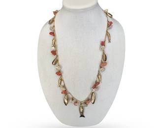 One of a kind designer necklace featuring brushed gold carp and sea shells w/coral accents;  24"