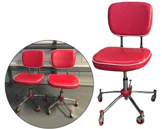 Pair of midmod, adjustable rolling desk chairs; fire engine red vinyl w/white piping; five-leg base w/caster wheels; popular industrial style in 1960’s

