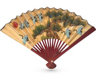 Chinese fan depicting cranes, pine trees and red peach, classic symbols of loyalty (cranes), longevity, prosperity and peace; hand painted with some age on it; 16”W