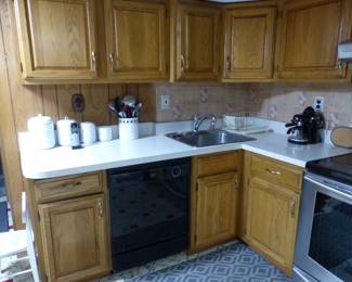Complete kitchen cabinets, dishwasher, stove, hood & fridge (bring tools to dismantle)