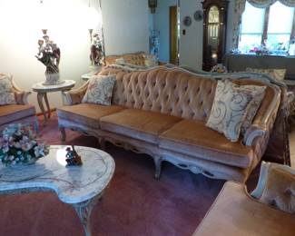 Velvet tufted sofa, loveseat & chair, marble top coffee & side table, figural lamp