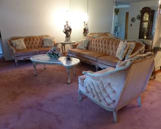 Velvet tufted sofa, loveseat & chair, marble top coffee & side table, figural lamp