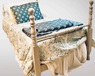 Set of cottage style twin beds