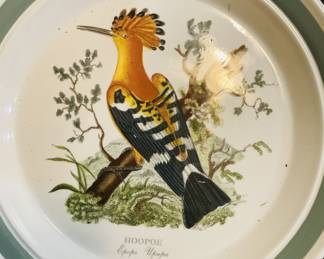 This is a Portmeirion 'Roller' bird plate.