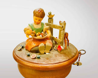 Vintage Thorens music box featuring a girl with birds.