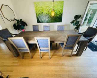 $2,600 - Restoration Hardware 8-person dining set. Table is 9' x 3'3" gray oak. 8 chairs are gray upholstered , in great condition.