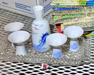 Several sets of collectible barware