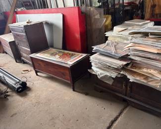 two wooden hope chests, tall dresser, short dresser, lots of art prints 