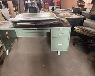 mcm office desk, lots of art prints 