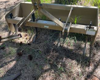 Box scraper goes with 1950s Ford tractor