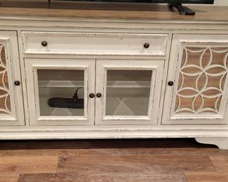 Magnolia Manor entertainment tv stand with power strip. Farmhouse white.