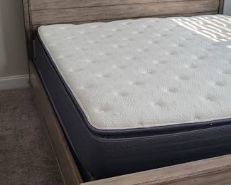King size grey bedframe with headboard, footboard, and side rails. Mattress and box spring sold separately as a set.