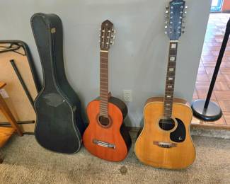2 guitars (12 string has a crack)