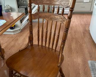 closeup of pressed back chairs, we have 4
