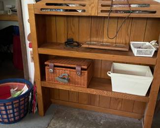 top of curio cabinet - on top of tool bench??? or put in closet w/baskets