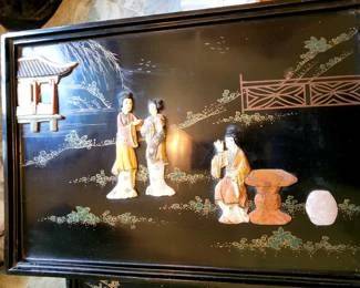 Inlay is likely mother of pearl or soap stone