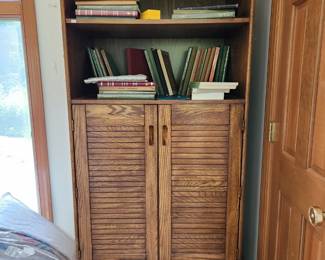 Vintage dresser with additional shelves behind doors