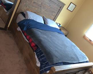 King bed set by Ashley (top of their line) bed, large dresser, mirror, night stand. available for pre sale.