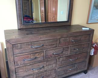 King bed set by Ashley (top of their line) bed, large dresser, mirror, night stand. available for pre sale.