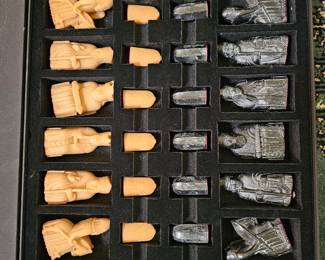 Replica of the 12th Century  isle of Lewis Chess Set boxed. 