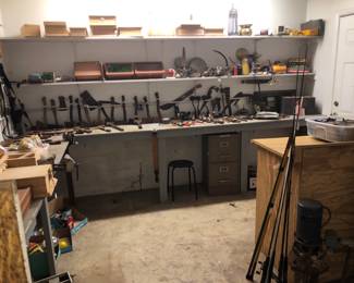 More antique tools.  Fishing rods & reels